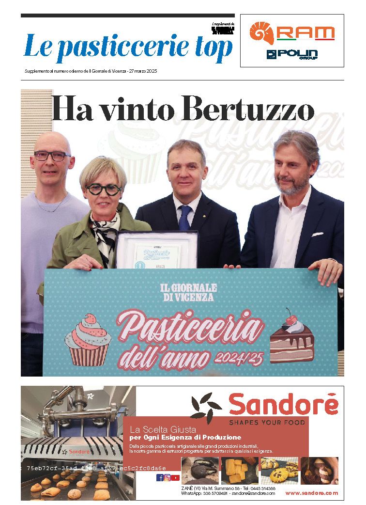 "Andrea Pertile di RAM accanto alla sfogliatrice Queen Line donata alla pasticceria vincitrice Bertuzzo di Vicenza."